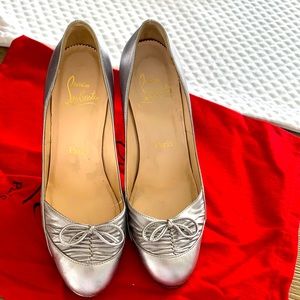 Christian Louboutin silver shoes in size 36